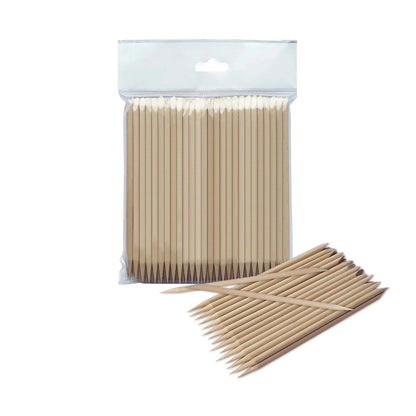 Paquet de bâtonnets de buis Staleks Expert 150 mm avec bâtonnets visibles à côté pour manucure.