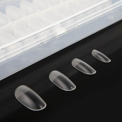 Quelques capsules Flexi Tips Oval de Nails Company présentées en différentes tailles