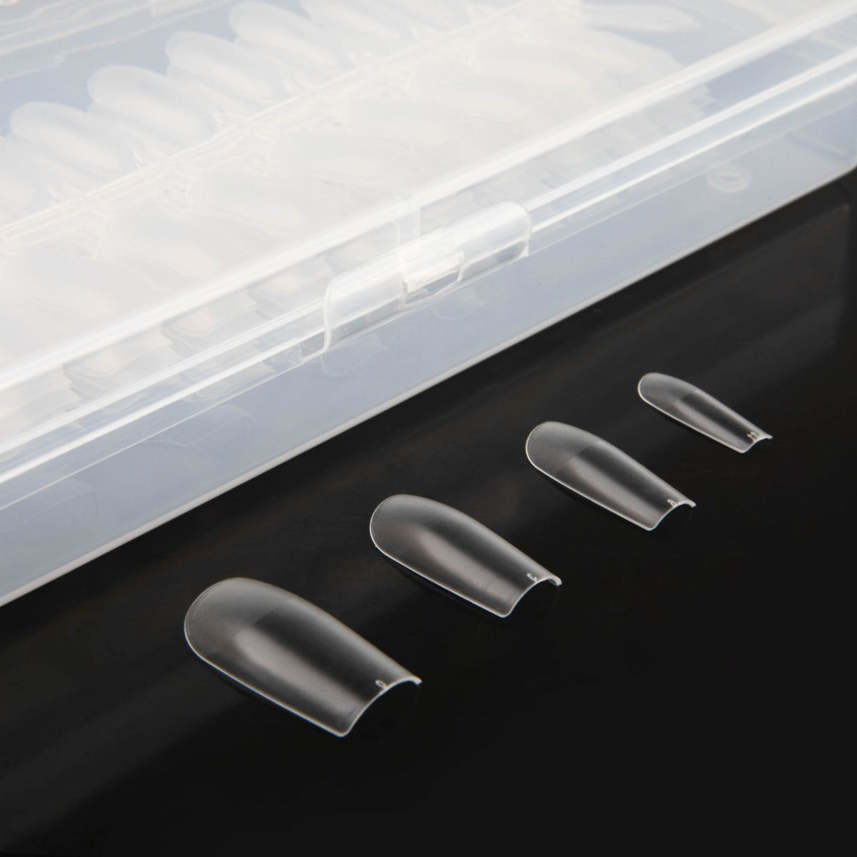Quelques capsules Flexi Tips Square de Nails Company présentées en différentes tailles