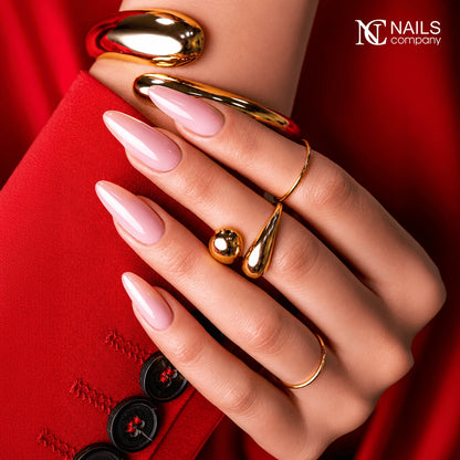 Manucure réalisée avec le gel Flow IQ Calm Powder Nails Company rose froid couvrant.