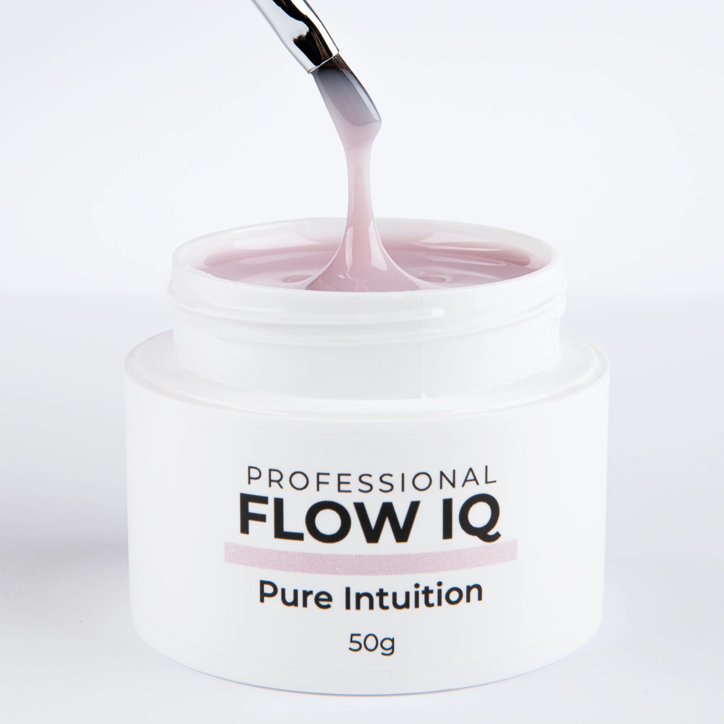 Pinceau tirant la matière du gel Flow IQ Pure Intuition Nails Company avec texture auto égalisante visible.