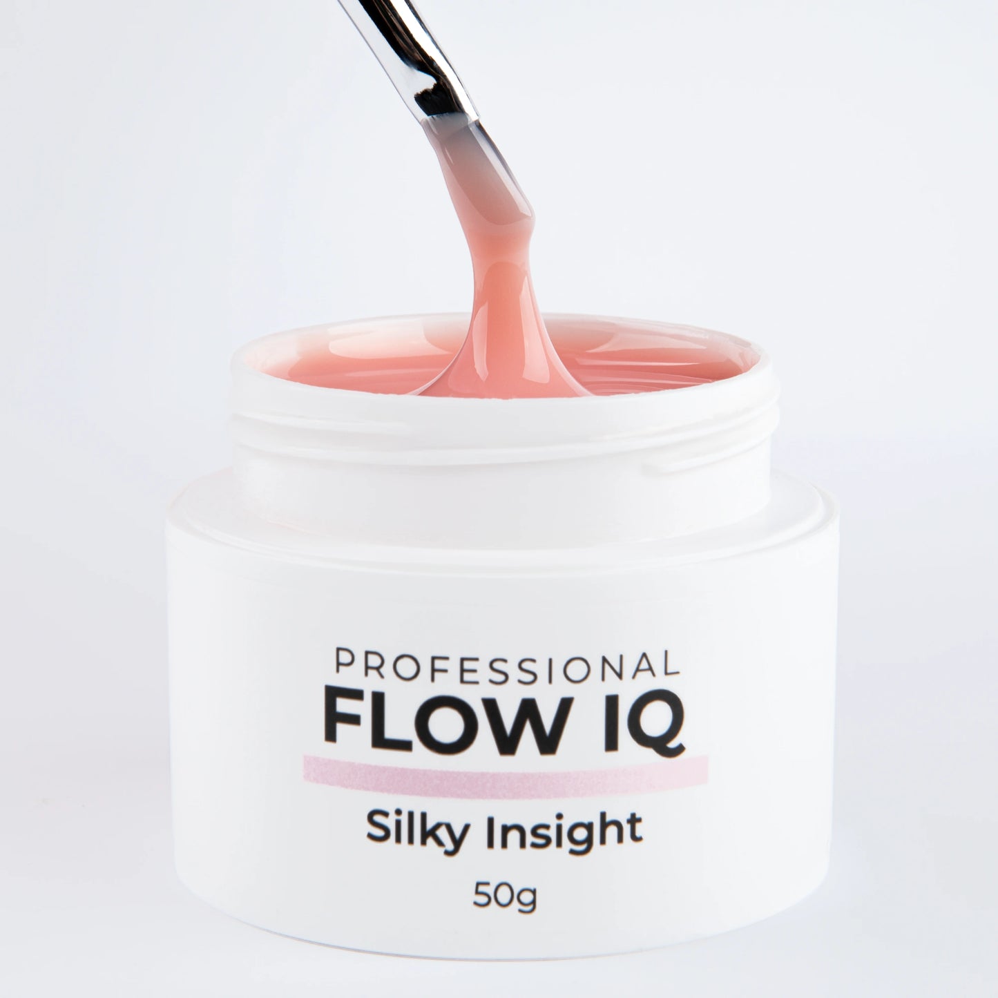 Pinceau tirant la matière du gel Flow IQ Silky Insight Nails Company avec texture auto égalisante visible.