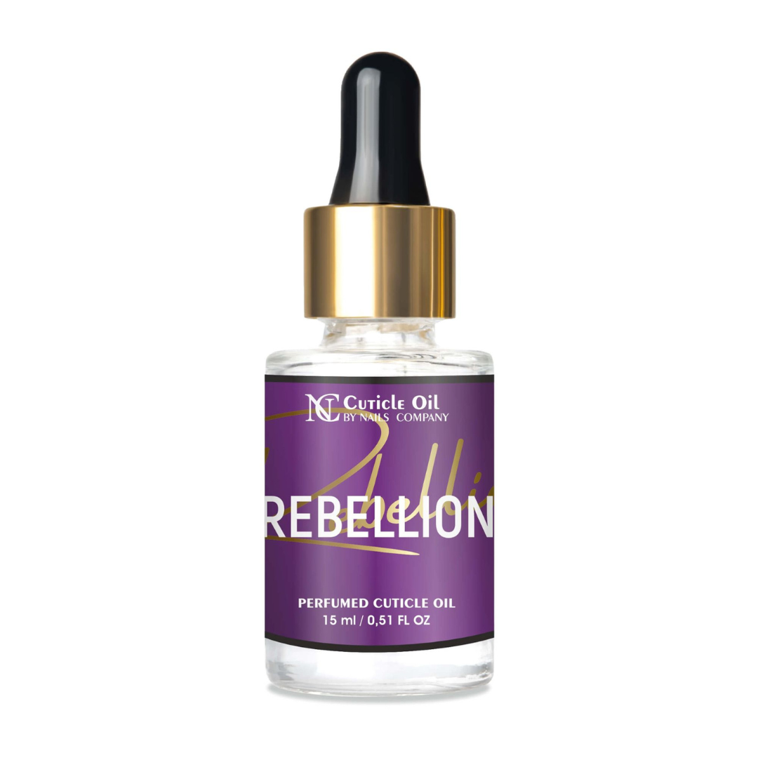 Flacon 15 ml de l’huile à cuticules Rebellion de Nails Company avec compte-gouttes, soin nourrissant inspiré du parfum Manifesto Elixir aux notes élégantes