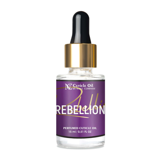 Flacon 15 ml de l’huile à cuticules Rebellion de Nails Company avec compte-gouttes, soin nourrissant inspiré du parfum Manifesto Elixir aux notes élégantes