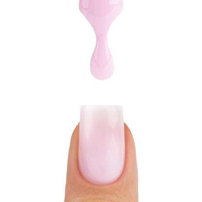 Application de Smart Base Pro Pink Affair Nails Company avec pinceau et matière rose lavande qui coule.