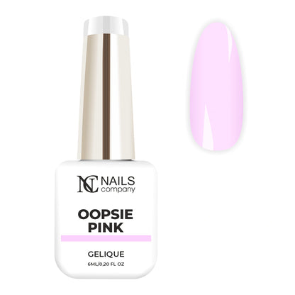 Flacon de vernis semi-permanent Oopsie Pink de Nails Company, collection Maby Baby, accompagné de tips